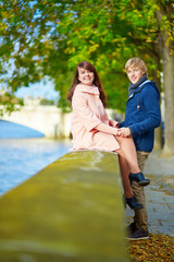 Dating couple in Paris on a spring day