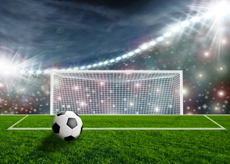 Fototapeta premium Piłka nożna na zielonej arenie stadionu