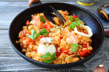 Paella with squid mussels