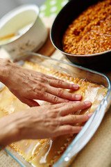 Cooking lasagna at home