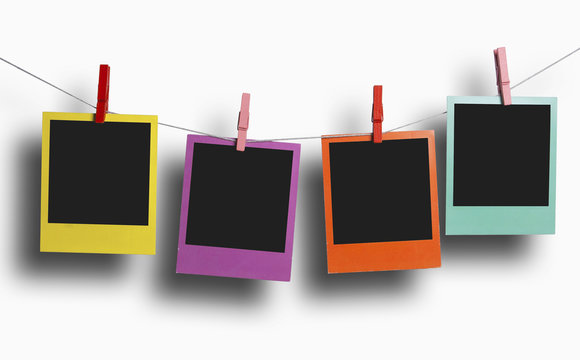 Color polaroids on a clothesline