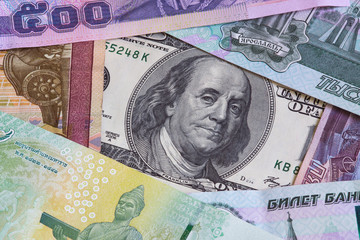 Dollars, bahts and roubles