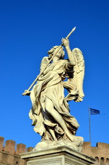 Sculpture of an angel  on Ponte Sant'Angelo, Rome, Italy