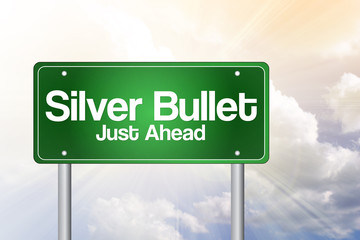 Silver Bullet Just Ahead Green Road Sign business concept