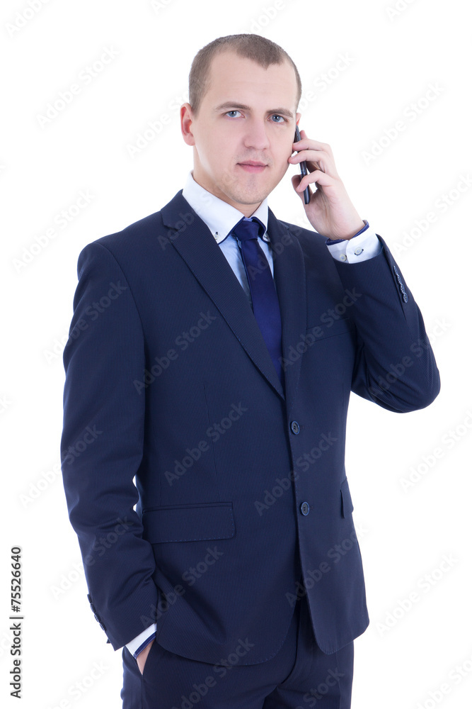 Wall mural young business man calling on the cell phone isolated on white