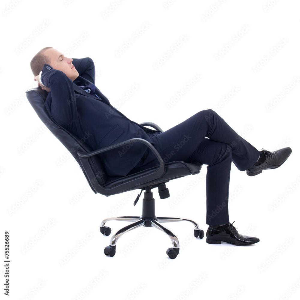 Wall mural happy business man sitting on office chair isolated on white