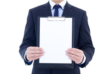 blank clipboard in young businessman's hands isolated on white