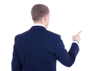 back view of young business man pointing at something isolated o