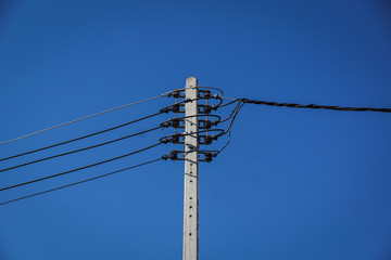 Obraz premium Poles are many power lines