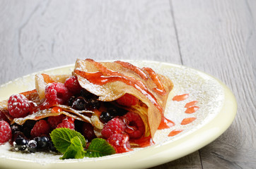 Crepes raspberry blueberries mint