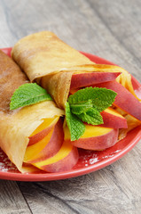 Crepes with peaches