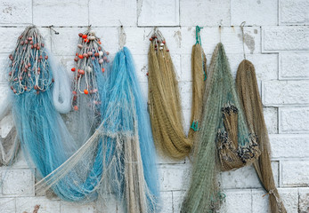 Fishing nets hanging on the wall