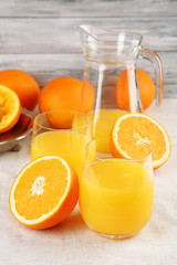 Fototapeta na wymiar Glass of orange juice with slices