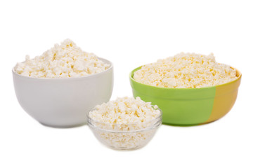 Fresh cottage cheese in bowls.