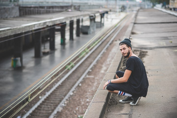 young handsome bearded hipster man