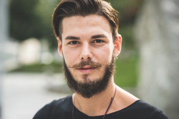 young handsome bearded hipster man