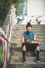 young handsome bearded hipster man