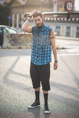 young handsome bearded hipster man