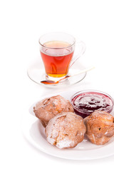 Cookies and tea composition on white.