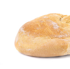 Round loaf of white bread. Close up.
