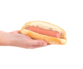 Hot dog in hand.