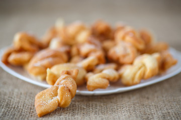 sweet pastry deep fried and sprinkled