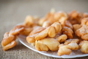 sweet pastry deep fried and sprinkled