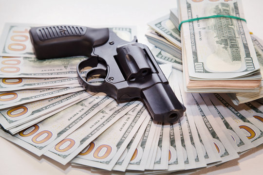 Gun with money on the table