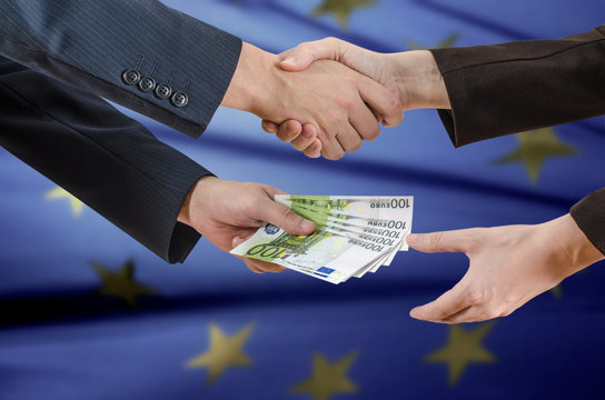 Man gives euro banknotes as a bribe