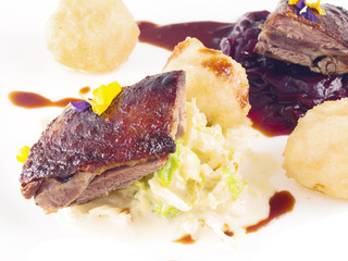 roast goose, red and white cabbage and dumplings