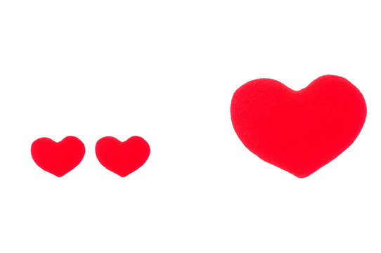A small red heart and a big red heart on a white background
