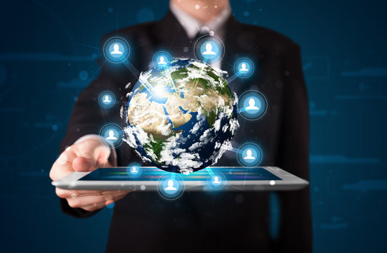 Businessman presenting 3d earth globe in tablet - Powered by Adobe