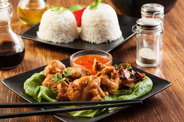 Fried chicken pieces in batter
