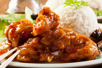 Fried chicken pieces with sweet and sour sauce