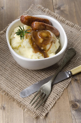 sausage and mashed potato with onion gravy