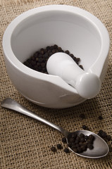 mortar and pestle with pepper