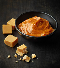Bowl of melted caramel cream