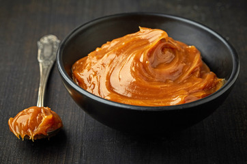 Bowl of melted caramel cream
