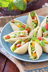 Vegetable salad served in pasta shells