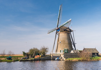 Fototapeta na wymiar Windmill in Kinderdijk Netherlands