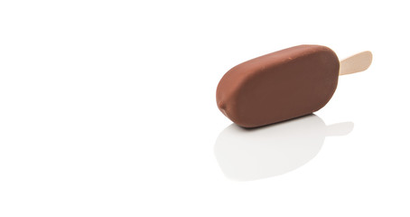 Chocolate ice cream over white background 