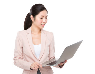 Businesswoman use of laptop computer