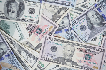 money in a chaotic manner on the floor