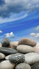 Image of stones on blue sky background