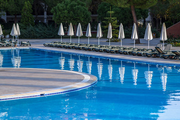 Sun loungers around the pool