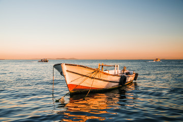Fishing boat on the  Istanbul marina at sunset, Turkey