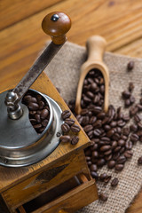 Manual coffee grinder and roasted beans