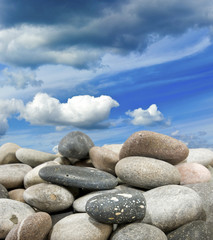 Fototapeta na wymiar stones on blue sky background