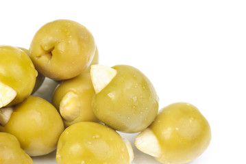 Green olives stuffed with almonds isolated on white background