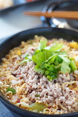 Egg noodles spicy soup with pork and vegetable